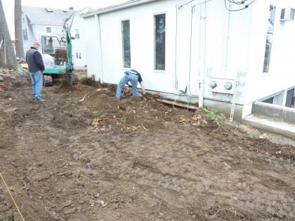 digging trench along house