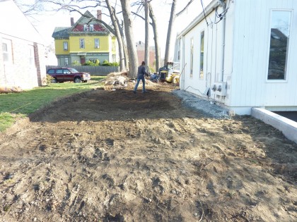 ready to spread compost in veggie zone