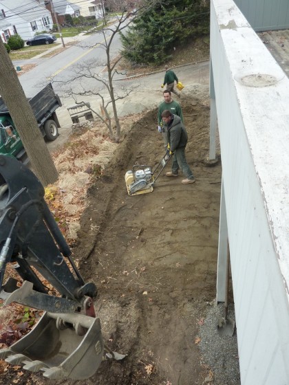 day 2 tamping lower patio