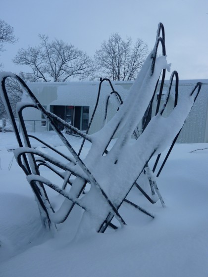 snow-covered butterfly chairs