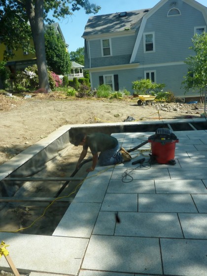 vacuuming the pond