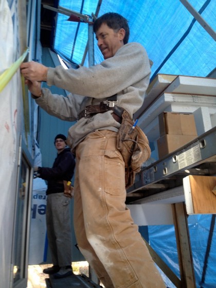 david and joe prepping for the deck ledger board