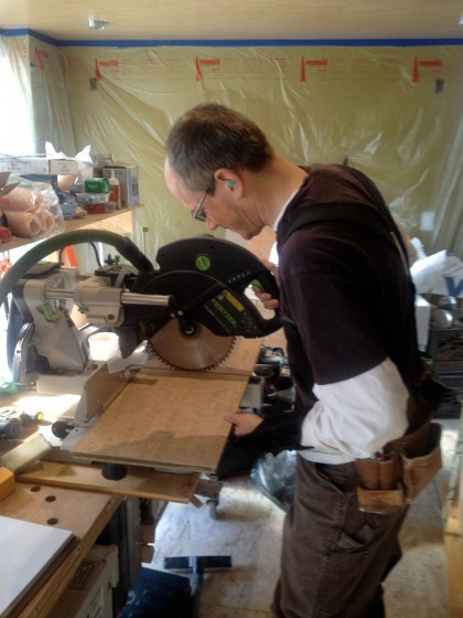 David trimming cork planks to fit