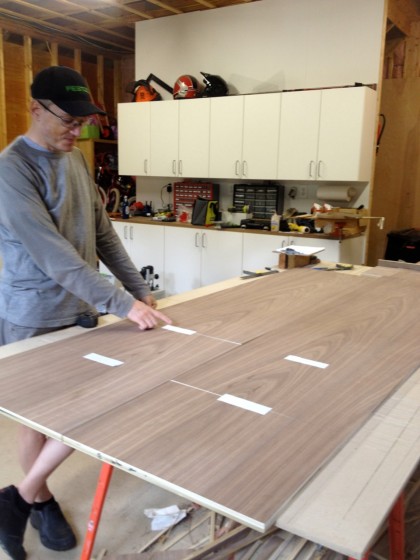 fingerpulls laid out on the cabinet doors and drawer fronts