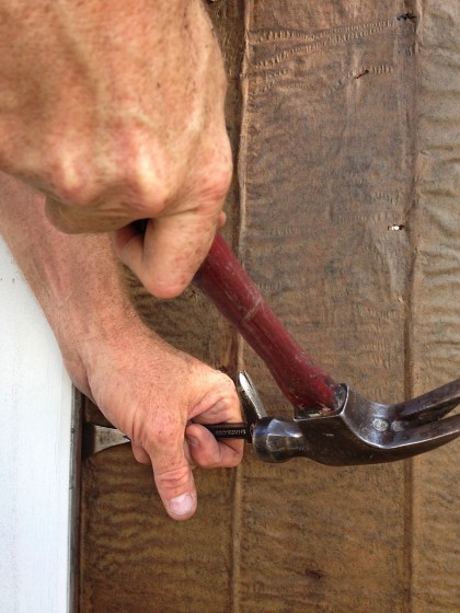 getting ready for steel: siding nail removal