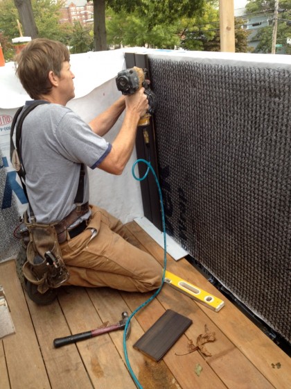 the Cedar Breather gets nailed on before the new siding